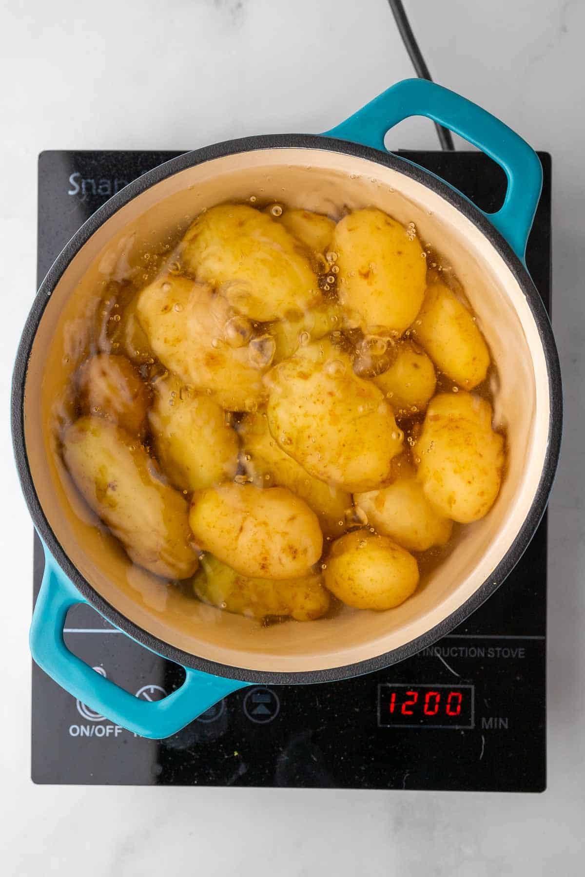 potatoes in a boiling pot of water