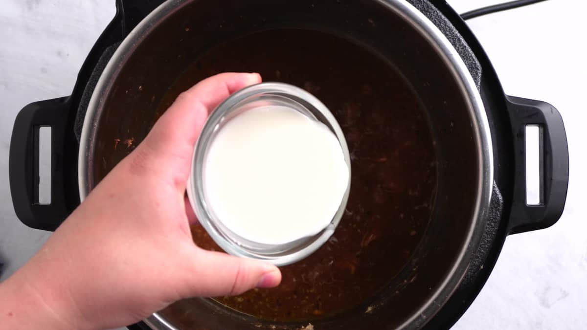 adding cornstarch slurry to the instant pot 