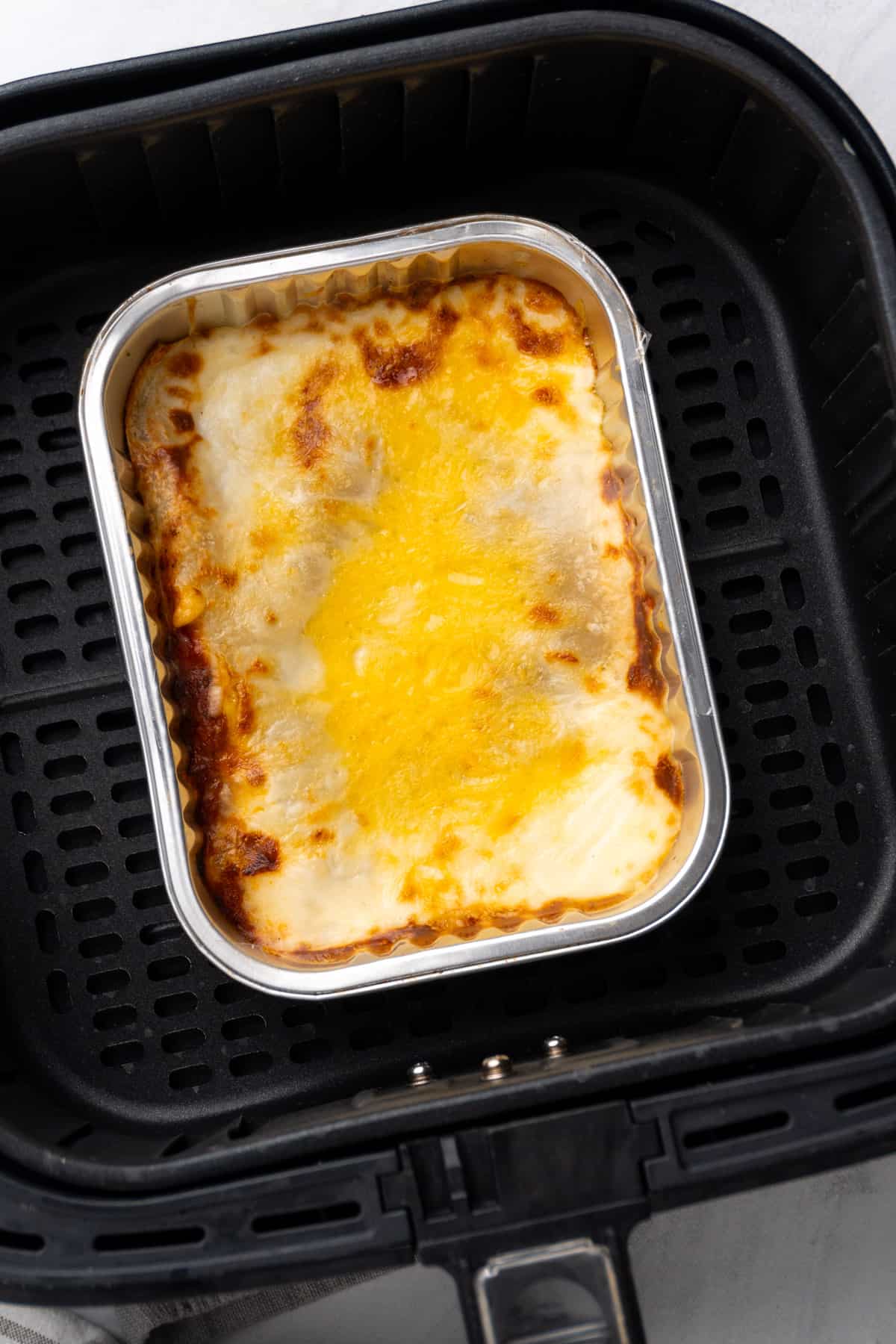 https://frommypantry.com/wp-content/uploads/2023/06/frozzen-lasagna-in-air-fryer-6.jpg